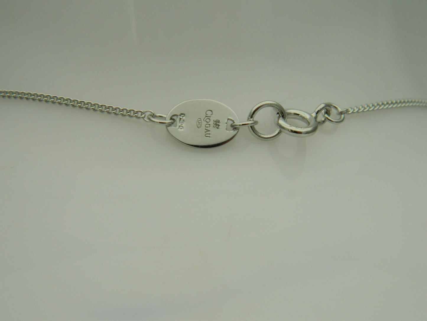Clogau Sterling Silver & 9ct Rose Gold Hearts Embrace Circular Pendant