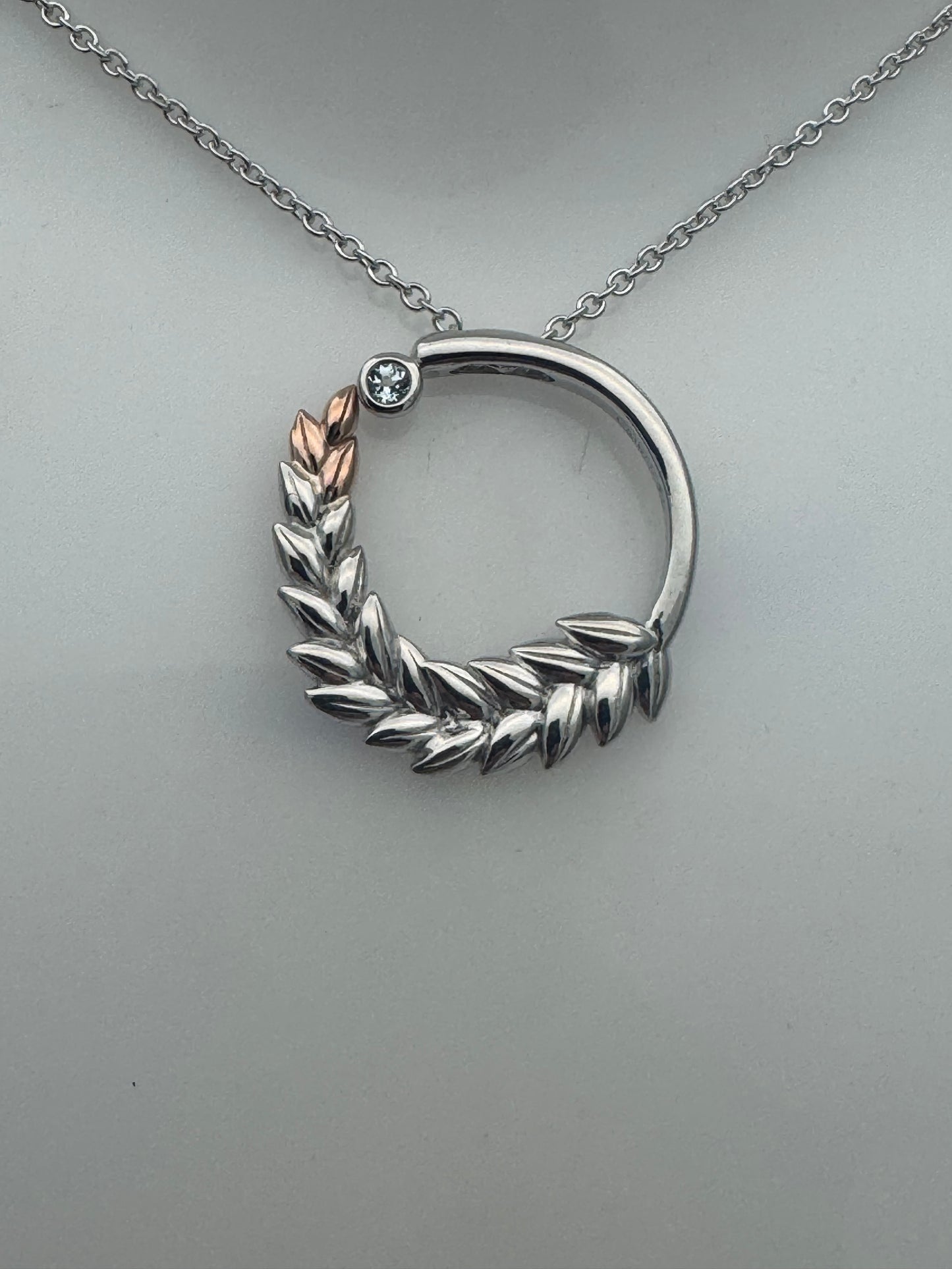 Clogau Sterling Silver & 9ct Rose Gold Lilibet Sky Blue Topaz Circular Pendant RRP £189.00