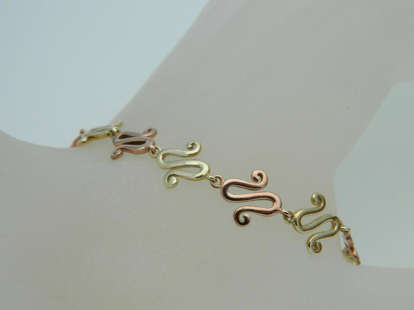 Clogau 9ct Yellow & Rose Gold Celtic Swirl Bracelet